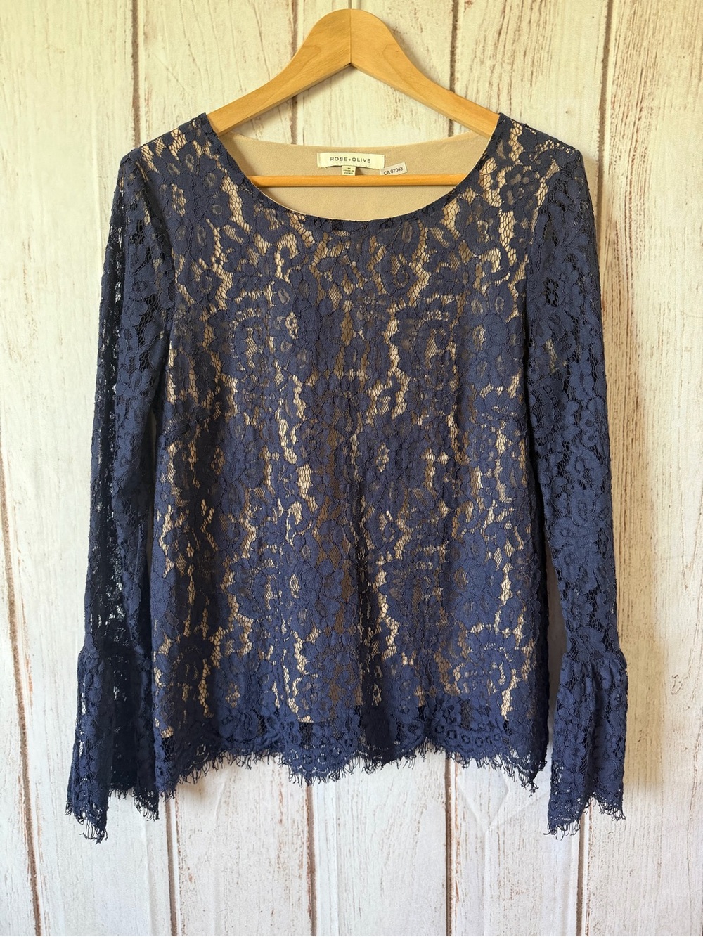 Rose + Olive Navy Blue Lace Long Sleeve Bell Sleeve Top
Size M